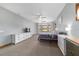 Spacious main bedroom with large windows, neutral tones, and carpet flooring at 975 Cr 542E, Bushnell, FL 33513