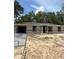 Charming single-story home featuring neutral colors and an attached garage, perfect for modern living at 10375 Se 126Th Ln, Belleview, FL 34420