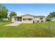 Expansive, green backyard complete with a screened in porch, ideal for relaxation and entertaining at 10720 Sw 63Rd Ave, Ocala, FL 34476