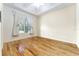 Cozy bedroom with hardwood floors, bright light and neutral paint at 10835 Se Highway 464C, Ocklawaha, FL 32179