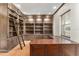 Elegant office features custom cabinets, desk, recessed lighting, and vinyl flooring at 10835 Se Highway 464C, Ocklawaha, FL 32179