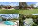 This unique property offers luxury living and amenities with pool, sports court, and separate guest house at 10835 Se Highway 464C, Ocklawaha, FL 32179