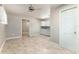 Room features tile floors, neutral colored walls, a ceiling fan and white cabinets at 10835 Se Highway 464C, Ocklawaha, FL 32179