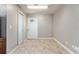 Room features tile floors, neutral colored walls and a door to the outside at 10835 Se Highway 464C, Ocklawaha, FL 32179