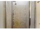 Modern tiled shower stall equipped with multiple shower heads and sleek fixtures at 10835 Se Highway 464C, Ocklawaha, FL 32179