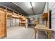 Spacious workshop featuring overhead lighting, shelving, and ample workspace for various projects at 10835 Se Highway 464C, Ocklawaha, FL 32179