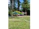 A variety of kayaks and canoes stored on a wooden rack in the community at 1112 Ne 130Th Ter, Silver Springs, FL 34488