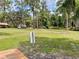 Community park featuring a playground, picnic tables, and mature trees, ideal for Gathering enjoyment at 1112 Ne 130Th Ter, Silver Springs, FL 34488