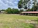 Community pavilion and picnic area surrounded by lush greenery, creating a serene space for residents to enjoy at 1112 Ne 130Th Ter, Silver Springs, FL 34488