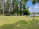 Community recreation area with kayak storage, benches, and lake access for outdoor adventures and relaxation at 1112 Ne 130Th Ter, Silver Springs, FL 34488
