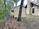 Backyard storage shed with chain link fence and some trees at 1112 Ne 130Th Ter, Silver Springs, FL 34488