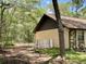 View of side exterior with a fence at 1112 Ne 130Th Ter, Silver Springs, FL 34488