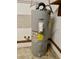 Water heater located in the utility closet of this home at 1112 Ne 130Th Ter, Silver Springs, FL 34488
