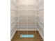 Walk-in pantry with wire rack shelving for organized storage at 13145 Sw 78Th Cir, Ocala, FL 34473