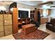Open living area with wood accents, tile flooring, and view of the kitchen at 17051 Ne 243Rd Place Rd, Fort Mc Coy, FL 32134