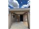 The covered patio area features sturdy support beams and a smooth concrete floor, ideal for outdoor gatherings at 21712 Sw Rainbow Lakes Blvd, Dunnellon, FL 34431