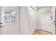 Hallway with closet and views to the exterior door at 23995 Nw Falcon Ave, Dunnellon, FL 34431