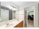 Bathroom features a double sink vanity with marble countertops at 2413 Se 23Rd St, Ocala, FL 34471