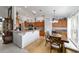 Bright kitchen features a breakfast nook, wood cabinets, and lots of counter space at 2413 Se 23Rd St, Ocala, FL 34471