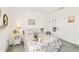 Cozy bedroom features floral bedding and decor, enhancing the room's warm ambiance at 2552 Ne 42Nd Rd, Ocala, FL 34470