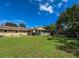 Large backyard with sunroom and fenced yard offers privacy and space at 3545 Se 24Th Ave, Ocala, FL 34471