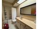 Bathroom featuring vanity, toilet, shower and plenty of natural light at 3545 Se 24Th Ave, Ocala, FL 34471