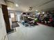 Spacious garage with ample storage, washer, dryer, and lots of tools at 3545 Se 24Th Ave, Ocala, FL 34471