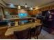 An open kitchen with lots of cabinet space, brick details, and updated appliances at 3545 Se 24Th Ave, Ocala, FL 34471