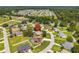 Overhead view of a home with a pool in a well-established neighborhood with mature trees at 4300 Nw 4Th Cir, Ocala, FL 34475