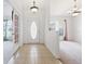 Bright foyer with tile flooring, leading to living spaces with abundant natural light at 4300 Nw 4Th Cir, Ocala, FL 34475