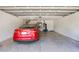 Well-lit two car garage interior featuring ample space for vehicle storage and organization at 4300 Nw 4Th Cir, Ocala, FL 34475
