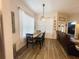 Dining Room with wood flooring, updated lighting at 5917 Ne 61St Avenue Rd, Silver Springs, FL 34488