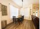 Eat-in dining room with access to living room at 5917 Ne 61St Avenue Rd, Silver Springs, FL 34488