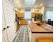 Kitchen with wood cabinets, stainless appliances, and breakfast bar at 5917 Ne 61St Avenue Rd, Silver Springs, FL 34488