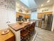 Spacious eat-in kitchen with butcher block island, and stainless appliances at 5917 Ne 61St Avenue Rd, Silver Springs, FL 34488
