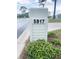 Curbside mailbox with the house number and surrounding greenery, adding to the home's curb appeal at 5917 Ne 61St Avenue Rd, Silver Springs, FL 34488