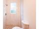 Bathroom featuring a marble tile shower and decorative pebble tile floor at 7 Hill Prince Dr, Ocala, FL 34482