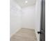 Clean, organized closet with wire shelving and wood-look flooring at 7 Hill Prince Dr, Ocala, FL 34482