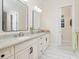 Bathroom features a double vanity and modern fixtures at 7695 Sw 188Th Ave, Dunnellon, FL 34432