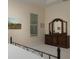 Bedroom featuring an antique dresser with multi-paneled mirror at 7695 Sw 188Th Ave, Dunnellon, FL 34432