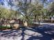 Entrance to KP Hole Park with stone sign, landscaping, and gated entrance at 7695 Sw 188Th Ave, Dunnellon, FL 34432