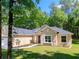 Lovely single-story house with a three-car garage and landscaped garden at 7695 Sw 188Th Ave, Dunnellon, FL 34432