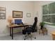 Home office with desk, executive chair, and natural light at 7695 Sw 188Th Ave, Dunnellon, FL 34432