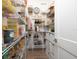 Walk-in pantry with wire shelving provides ample storage space at 7695 Sw 188Th Ave, Dunnellon, FL 34432