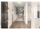 Inviting home entryway with tiled floor leading into carpeted living spaces at 8 Diamond Club Rd, Ocala, FL 34472