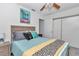 Comfortable bedroom with large bed, stylish decor, and ample natural light offers a cozy and relaxing retreat at 8144 Sw 108Th Street Rd, Ocala, FL 34481