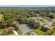 Aerial view of the community amenities including a tennis court, pool, and clubhouse at 8247 Sw 105Th Pl, Ocala, FL 34481