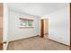 Neutral bedroom with carpet flooring, closet, and natural light at 8247 Sw 105Th Pl, Ocala, FL 34481