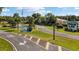 Community entrance with beautiful landscaping, fountain, and well-maintained grounds at 8247 Sw 105Th Pl, Ocala, FL 34481