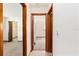 Hallway leading to carpeted bedrooms and closets at 8247 Sw 105Th Pl, Ocala, FL 34481